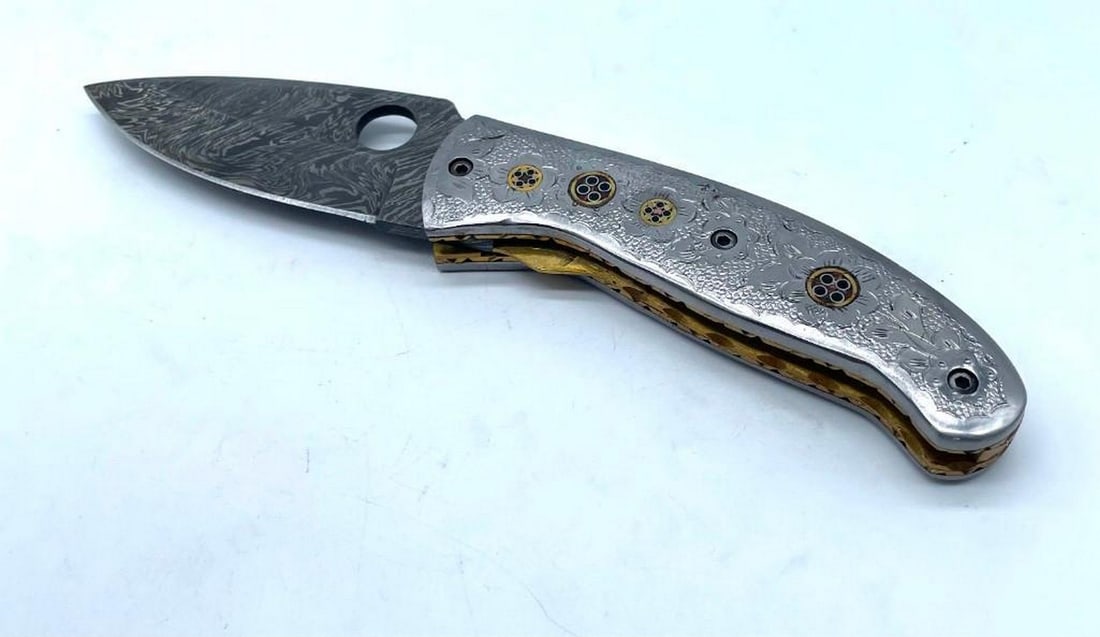 Damascus Steel & Brass Inlaid & Riveted Pocket Knife: Damascus Steel & Brass Inlaid & Riveted Pocket Knife. High Quality steel is utilized to forge the finest product in the world. Unique Custom Hand-Forged Damascus Steel Shive Sword Blade Construction: