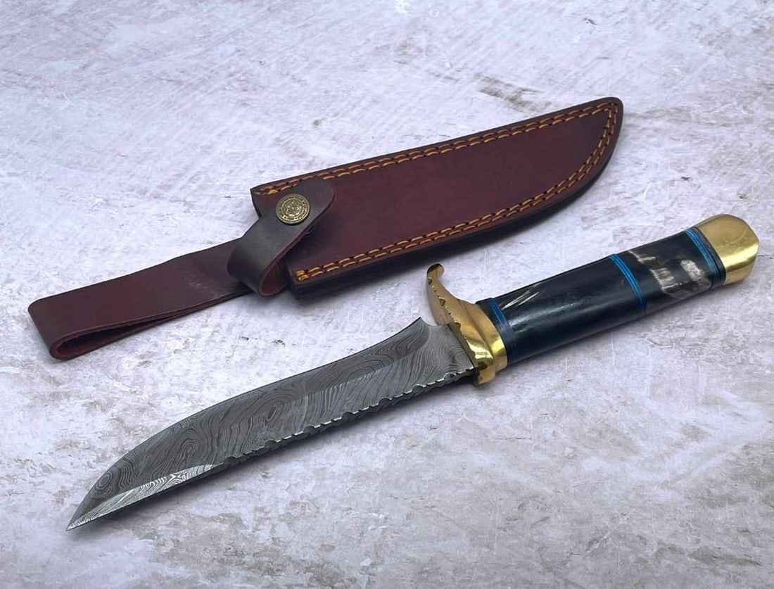 11 1/2" Inlaid Wood & Brass Handle Damascus Hunting Knife With Stitched Leather Sheath: 11 1/2" Inlaid Wood & Brass Handle Damascus Hunting Knife With Stitched Leather Sheath. An Excellent Hand Crafted Shive To Add To Any Collection. High Quality steel is utilized to forge the