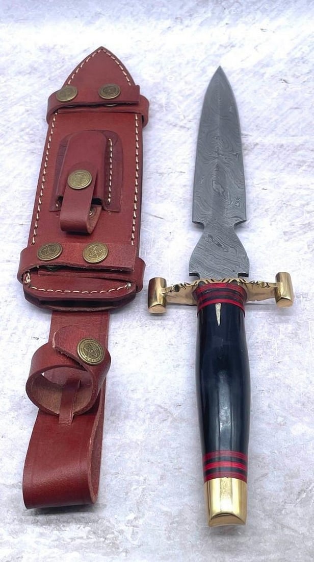 15 1/2" Brass & Wooden Handled Damascus Shive Sword: 15 1/2" Brass & Wooden Handled Damascus Shive Sword With Stitched Leather Sheath An Excellent Hand Crafted Shive To Add To Any Collection. High Quality steel is utilized to forge the finest produc