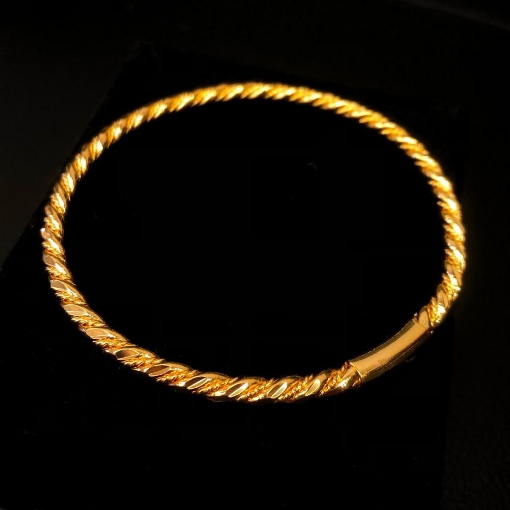Ladies 10k Yellow Gold Plated Rope Braid Bracelet: A Ladies 10 Karat Yellow Gold Plated Bracelet With Unique Rope Braid Twist. View Photos For Details.