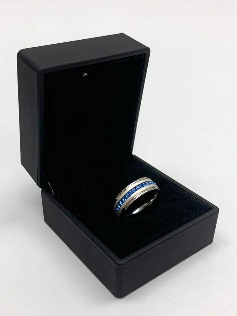 Ladies Titanium Steel Silver Brushed Blue Rhinestone Engagement Ring: Ladies Titanium Steel Silver Brushed Blue Rhinestone Engagement Ring. Brand New, Size 10. See Photos for Further Inquiry.