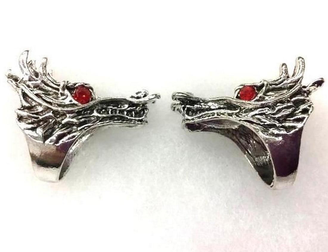 Silver Dragon Head Ring Set with Red Eyes: Silver Dragon Head Ring Set with Red Eyes Unleash your inner strength with this striking two-ring set, each featuring a fierce silver-colored dragon head design. Detailed with vivid red eyes for a
