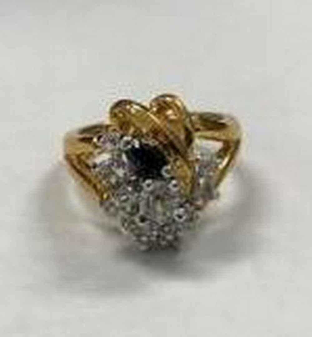 Gold Electroplated Ring with Clear and Black Gemstones: Gold Electroplated Ring with Clear and Black Gemstones Make a sophisticated statement with this stunning gold electroplated cluster ring, beautifully designed with a sparkling arrangement of clear
