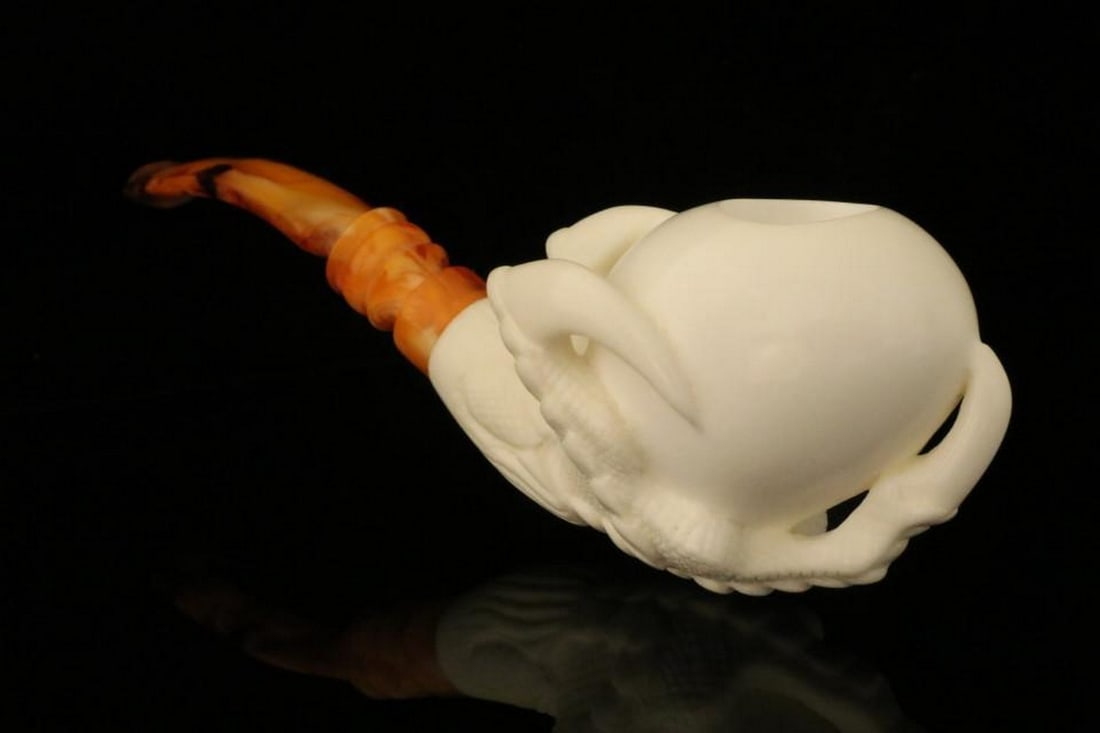 Soaring Eagle's Claw Artisan Block Meerschaum Pipe with Fitted Case: Soaring Eagle's Claw Artisan Block Meerschaum Pipe with Fitted Case This striking Eagle's Claw block meerschaum pipe captures the majestic essence of the eagle in flight. Expertly carved for both visu