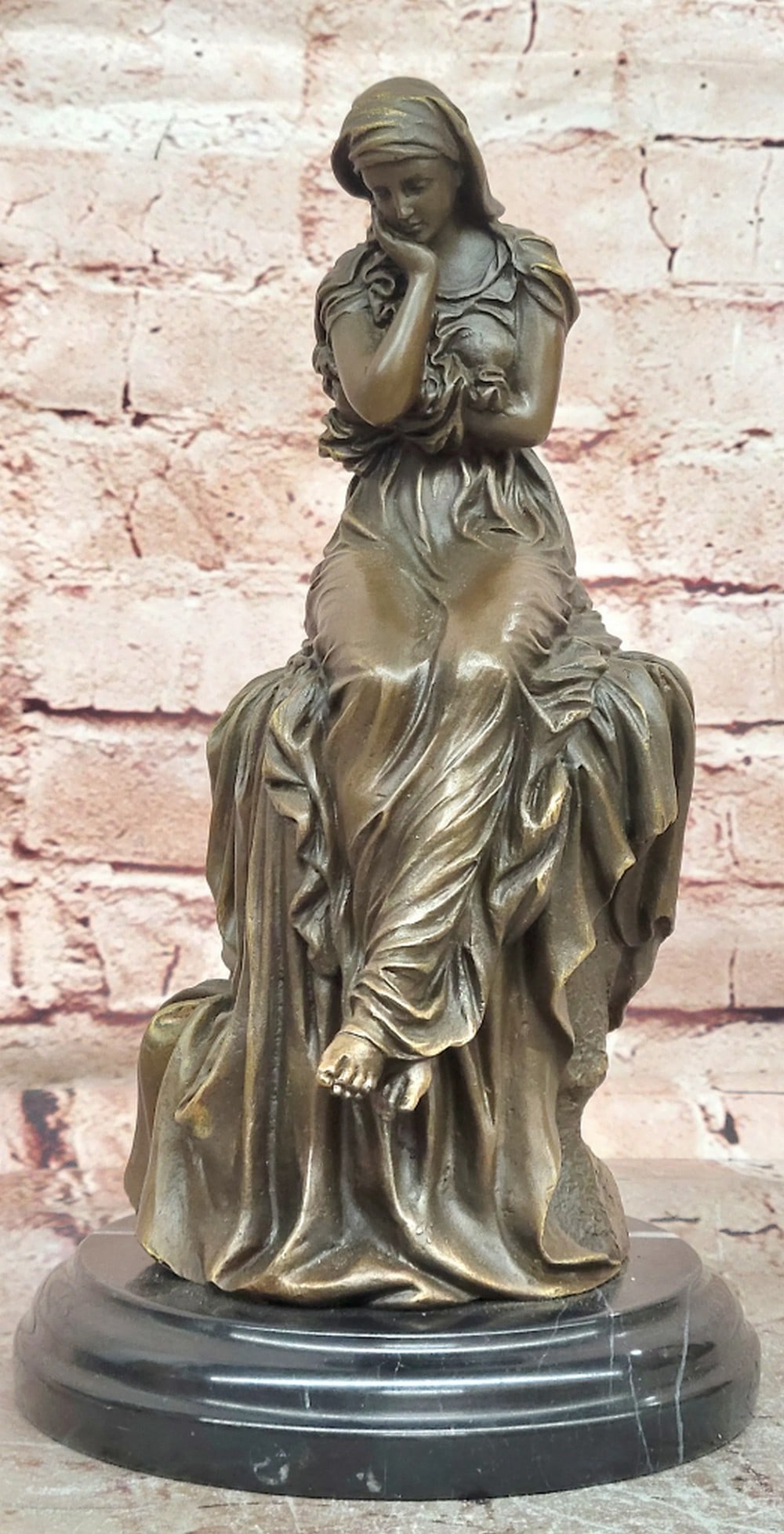 Seated Woman Bronze Sculpture by Mario Nick - 11" x 6": Seated Woman Bronze Sculpture by Mario Nick - 11" x 6" Introducing an Elegant Bronze Sculpture: This depiction of a seated woman is meticulously handcrafted with careful attention to detail. T