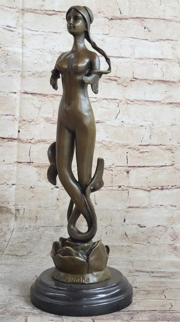 Standing Mermaid Bronze Statue: Standing Mermaid Bronze Statue This rather weird but unique statue of a woman that is half mermaid half human. She Stand atop a beautiful detailed rose, she has no hands her arms cut off by where her 