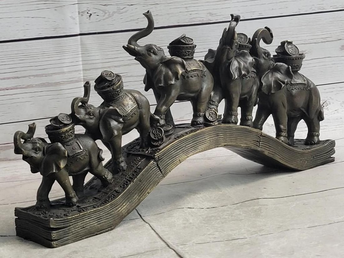 Good Fortune Elephants Crossing Bridge Bronze Sculpture: Good Fortune Elephants Crossing Bridge Bronze Sculpture The members of an elephant clan can be imagined on the banks of a watering hole in the hot plains of Africa. Reaching the final destination afte