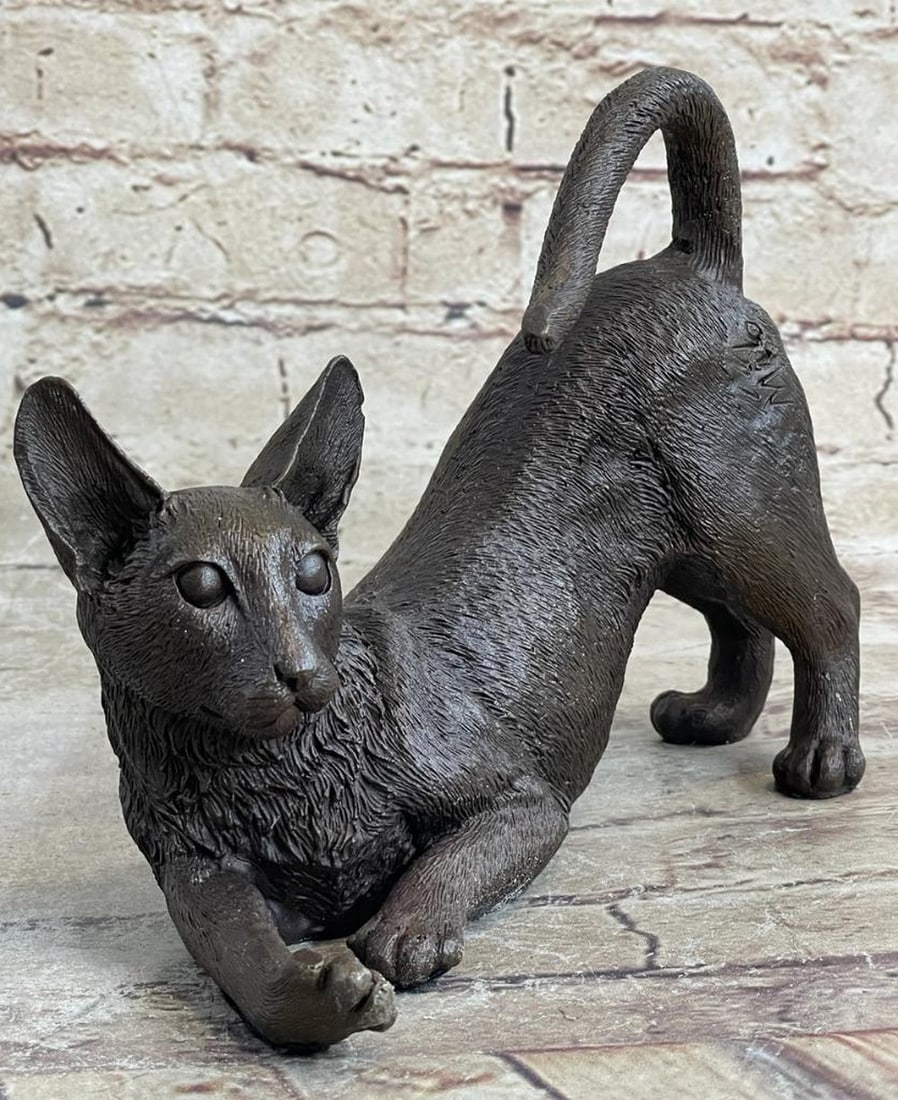 Playful Siamese Cat Inspired Bronze Statue - 6" x 9": Playful Siamese Cat Inspired Bronze Statue - 6" x 9" In the gentle morning light, the Siamese cat gracefully stretches, embodying the potential of a day ahead. Radiating feline elegance, it ga