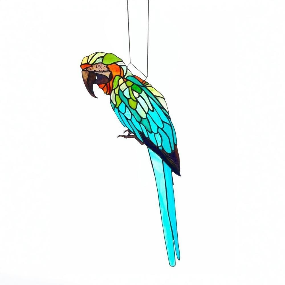 Mr Feathers' Stained Glass Parrot by Laura Kriefman: 'Mr Feathers' Stained Glass Parrot by Laura Kriefman This stained glass artwork depicts a parrot form, combining stained glass, vitreous paint, and copper foil. The composition emphasizes shape and co