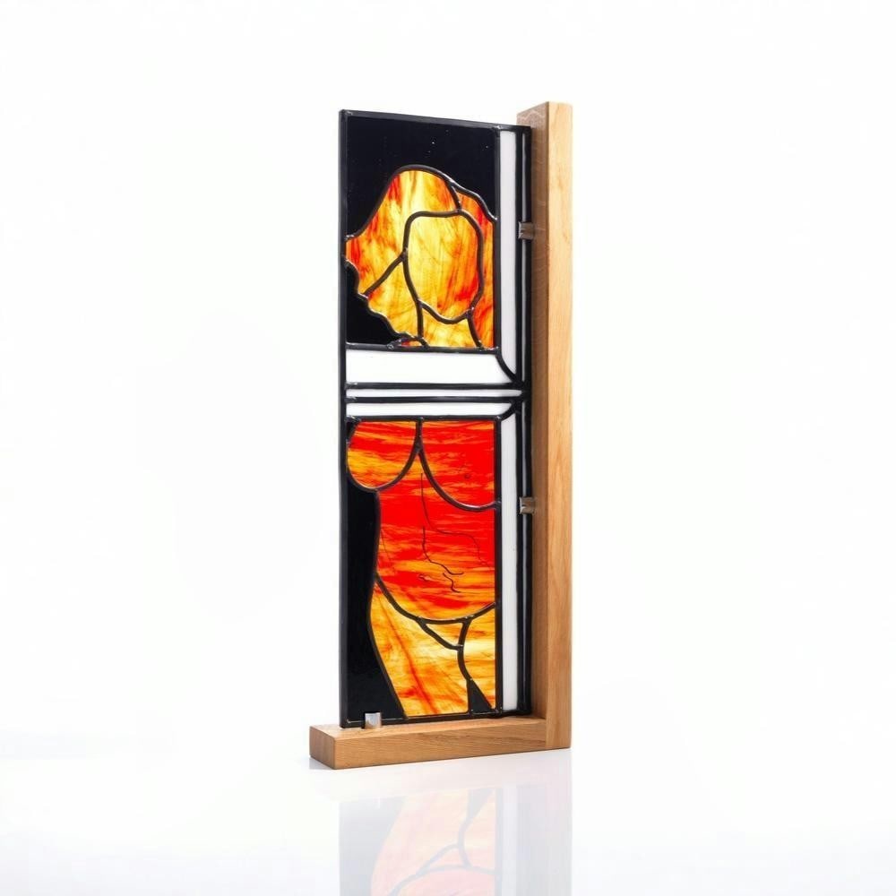 Alfreda' Woman Stained Glass by Laura Kriefman: 'Alfreda' Woman Stained Glass by Laura Kriefman This stained glass artwork depicts a female figure partially revealed within a split-window composition, emphasizing form and spatial framing. Created u