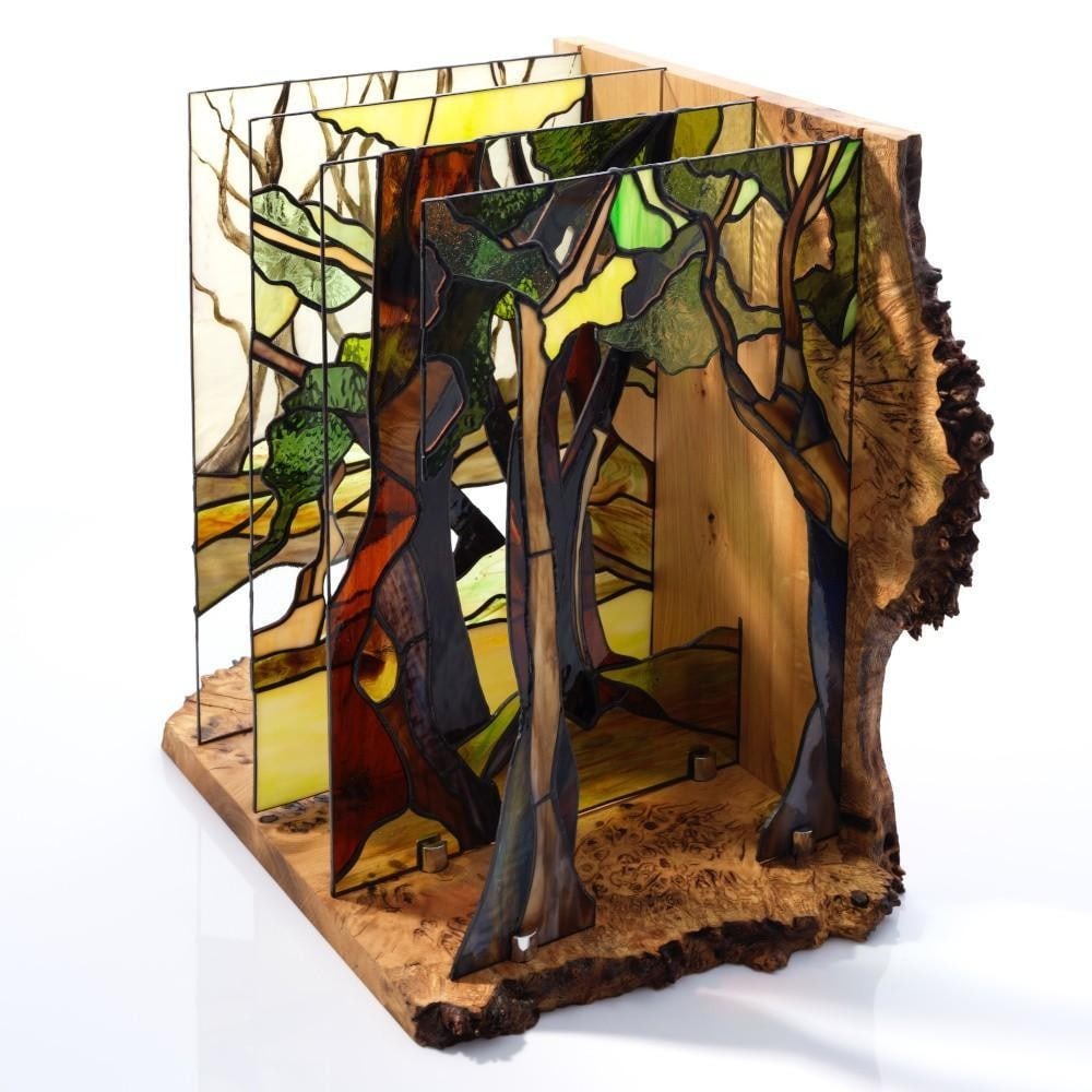 Rainforest' Stained Glass Trees by Laura Kriefman: 'Rainforest' Stained Glass Trees by Laura Kriefman This stained glass artwork presents a layered forest scene, constructed from multiple layers of glass to create depth and spatial dimension. The comp