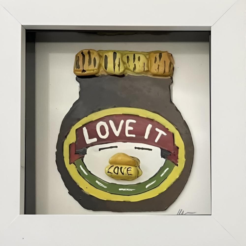 Love It!' Handcrafted Sea Glass Wall Art by Sea on Glass: Love It!' Handcrafted Sea Glass Wall Art by Sea on Glass This framed artwork features a cheerful composition made from hand-collected sea glass. Each piece has been naturally smoothed by the ocean and
