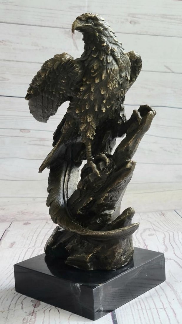Falcon Perched on Branch Original Bronze Statue - 11" x 5.5": Falcon Perched on Branch Original Bronze Statue - 11" x 5.5" This striking bronze sculpture captures an eagle perched atop its nest in quiet vigilance, every feather and feature masterfully cr