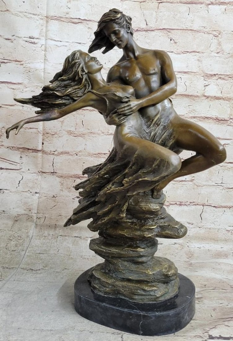 Floating Couple Bronze Sculpture by Aldo Vitaleh Original Bronze Statue - 16" x 10": Floating Couple Bronze Sculpture by Aldo Vitaleh Original Bronze Statue - 16" x 10" Introducing an Impressive Bronze Sculpture: This figure of a man holding a child aloft is meticulously handc