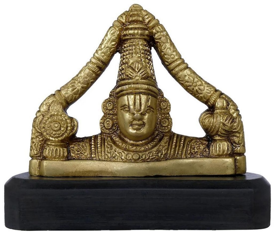 3" Handcrafted Brass and Wood Tirupati Balaji for Car Dashboard: 3" Handcrafted Brass and Wood Tirupati Balaji for Car Dashboard This finely handcrafted idol features Lord Tirupati Balaji in his iconic form, mounted on a wooden base for car dashboards. Cast in 
