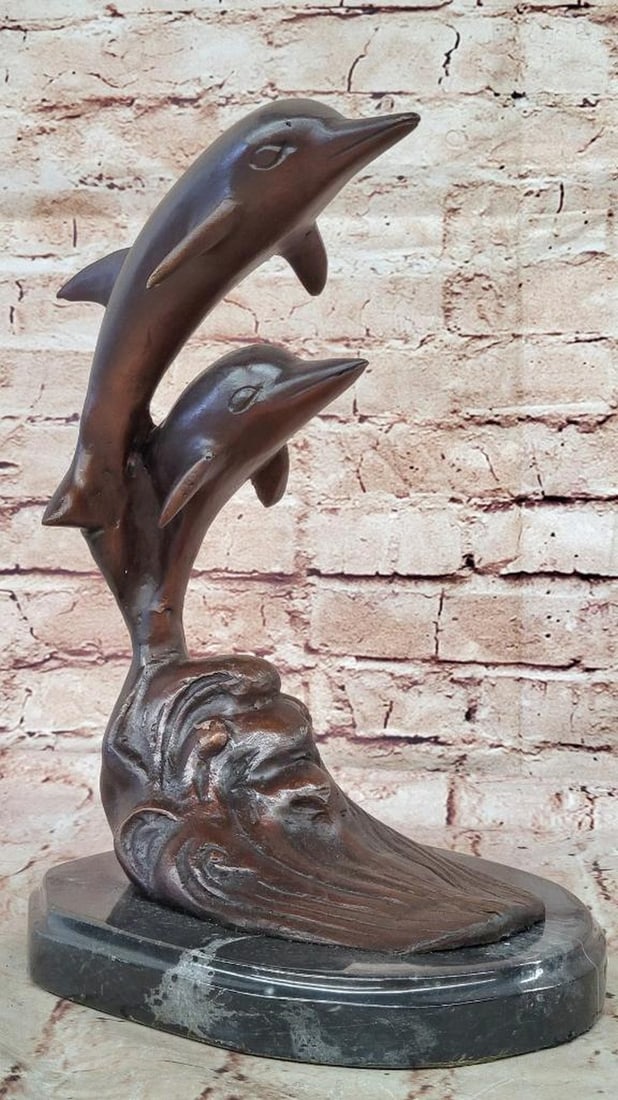 Free Spirit Dolphins" Signed & Numbered Original Bronze Sculpture - 11.5" x 8: "Free Spirit Dolphins" Signed & Numbered Original Bronze Sculpture - 11.5" x 8" This signed, limited-edition bronze sculpture by Miguel Lopez (Milo) captures the grace and vitality of 