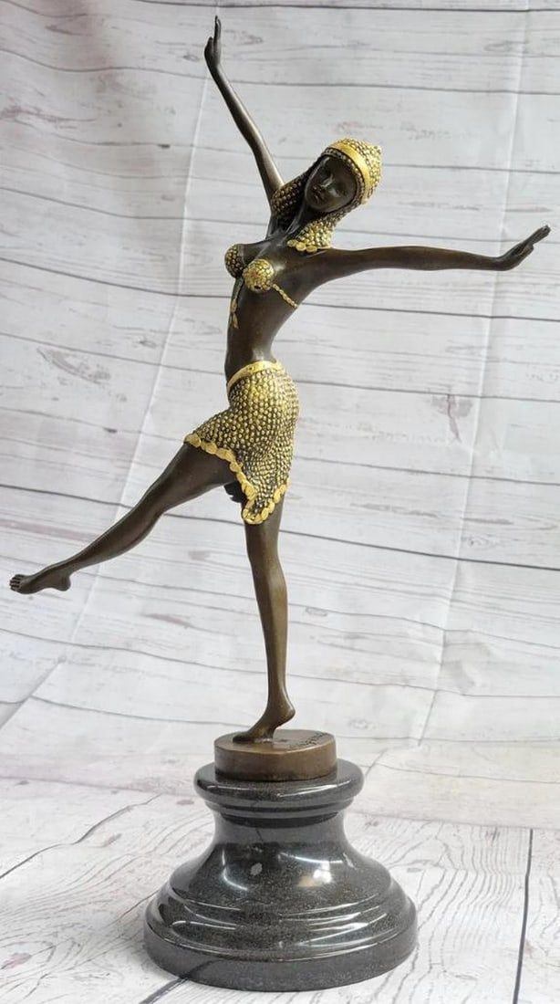 Dance in Motion Inspired Bronze Sculpture of a Dynamic Exotic Performer by D.H Chiparus - 17" x 14": Dance in Motion Inspired Bronze Sculpture of a Dynamic Exotic Performer by D.H Chiparus - 17" x 14" This bronze sculpture captures the exuberance and dynamism of a spirited dancer in the peak 