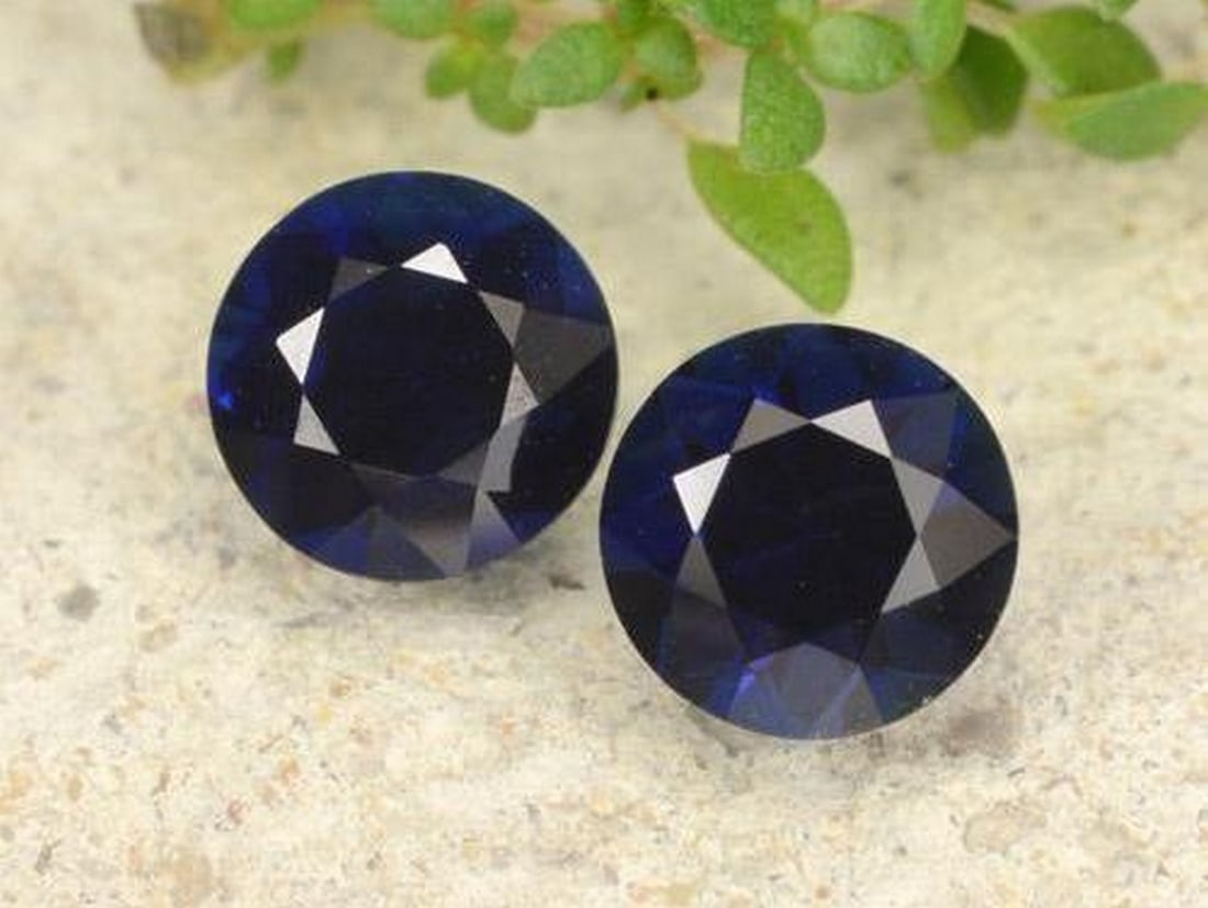 1.14 ct Natural Royal Blue Sapphires, Round Diamond-Cut, VVS - VS, Madagascar: 1.14 ct Natural Royal Blue Sapphires, Round Diamond-Cut, VVS - VS, Madagascar Pair of natural sapphires weighing a total of 1.14 carats (about 0.57 carats each), cut in round diamond-cut facet with a