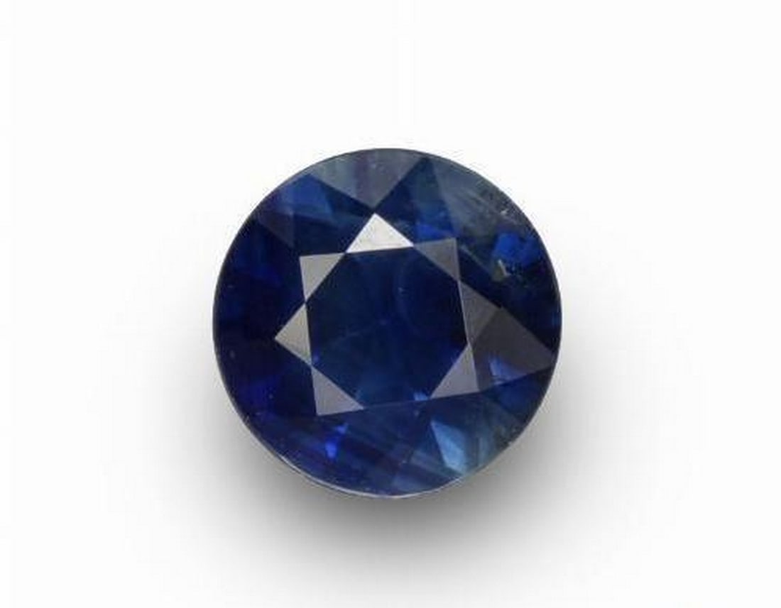 0.67 ct Natural Twilight Blue Sapphire, Round Diamond-Cut, VS, Madagascar: 0.67 ct Natural Twilight Blue Sapphire, Round Diamond-Cut, VS, Madagascar Natural sapphire weighing 0.67 carats, cut in a round diamond-cut facet with twilight blue color. The gem measures 5.11 x