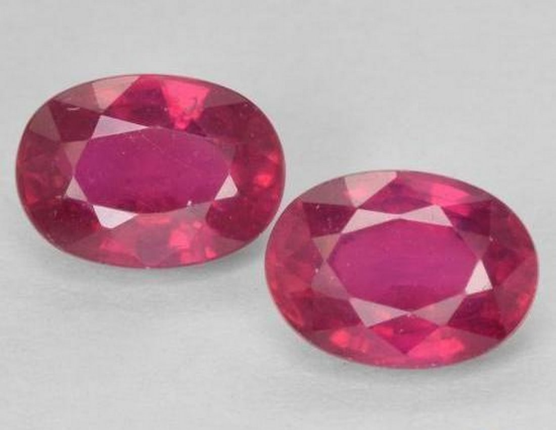 2.77ct Natural Light Red Rubies, Oval Facet, VS, Madagascar (Pair): 2.77ct Natural Light Red Rubies, Oval Facet, VS, Madagascar (Pair) Pair of natural ruby gemstones with a combined weight of 2.77 carats (average 1.39 carats each), cut in an oval facet shape with a