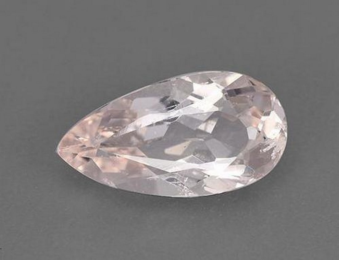 1.86ct Natural Flamingo Pink Morganite, Pear, VS: 1.86ct Natural Flamingo Pink Morganite, Pear, VS A natural morganite weighing 1.86 carats, cut in an elegant pear facet with a soft flamingo-pink hue and VS clarity. Measuring 11.82 x 6.32 x 4.58 mm, 