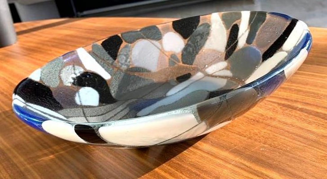 Pebble Beach Bowl by April Pebble: Pebble Beach Bowl by April Pebble The concept for the 'Pebble Bowl' was inspired by the feeling of smooth, warm stones on the beach, heated by the summer sun, and the fascinating formations they