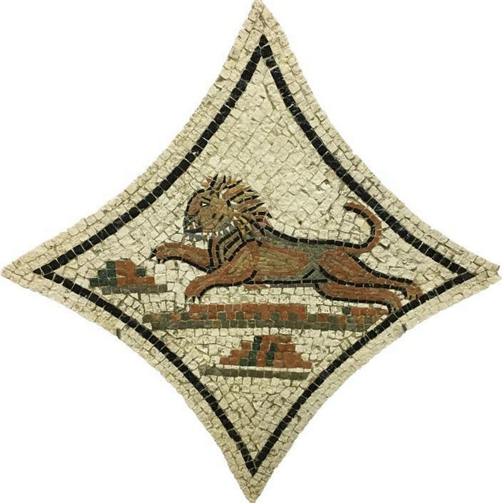 Lion - Mosaic Fragment: Lion - Mosaic Fragment The Lion - Mosaic Fragment from the "Mosaico de los Amores" is apart of the wide collection of Mythological Mosaics. This masterpiece is an entirely handmade mosaic repr