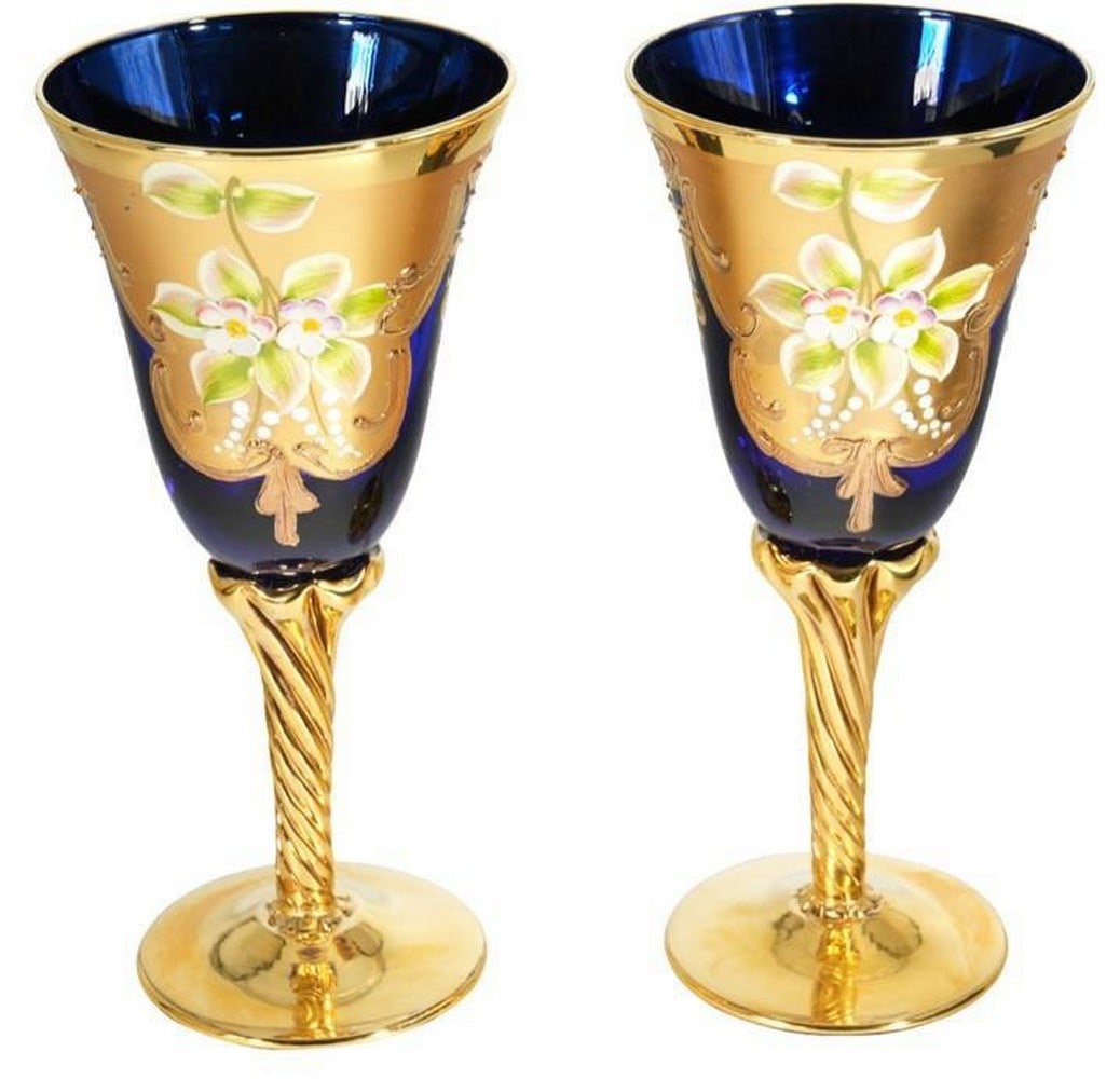 Trefuochi Glass Pair: Trefuochi Glass Pair This set of two Trefuochi glasses showcases the artistry of Italian glassmaking with bold, organic patterns and striking color contrasts. Each glass is individually hand-blown,