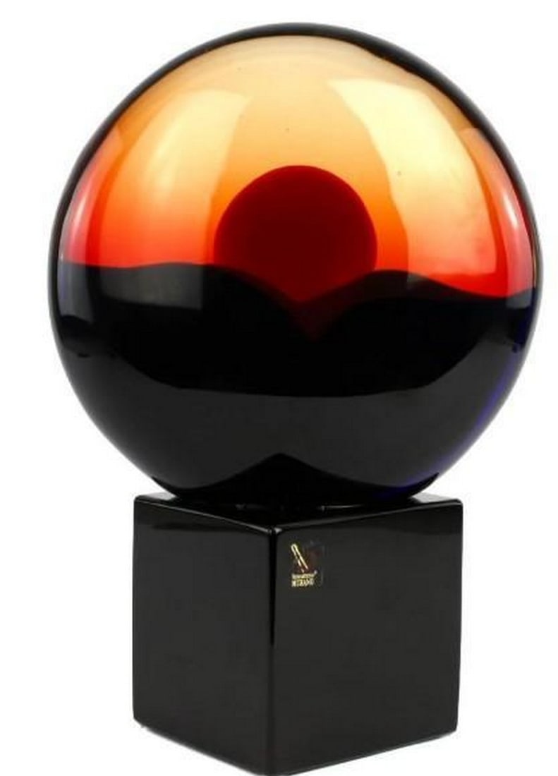 Sunset Glow Sculpture: Sunset Glow Sculpture Radiating warmth and motion, Sunset Glow is an abstract Murano glass sculpture that captures the fleeting brilliance of the day's end. Hand-blown by master artisans, it features 