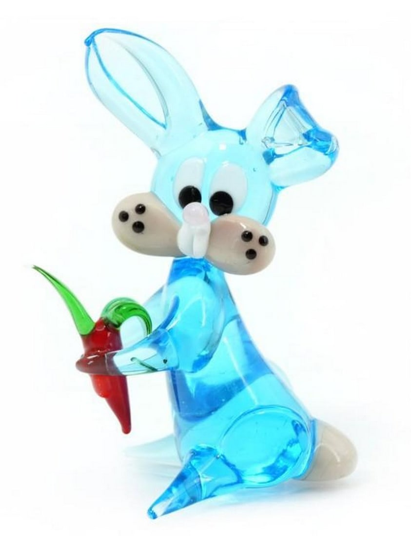 Miniature Blue Bunny Sculpture: Miniature Blue Bunny Sculpture Delicate and playful, this light blue rabbit miniature is handcrafted from Murano glass with soft, translucent hues that evoke a sense of calm and whimsy. Sculpted with