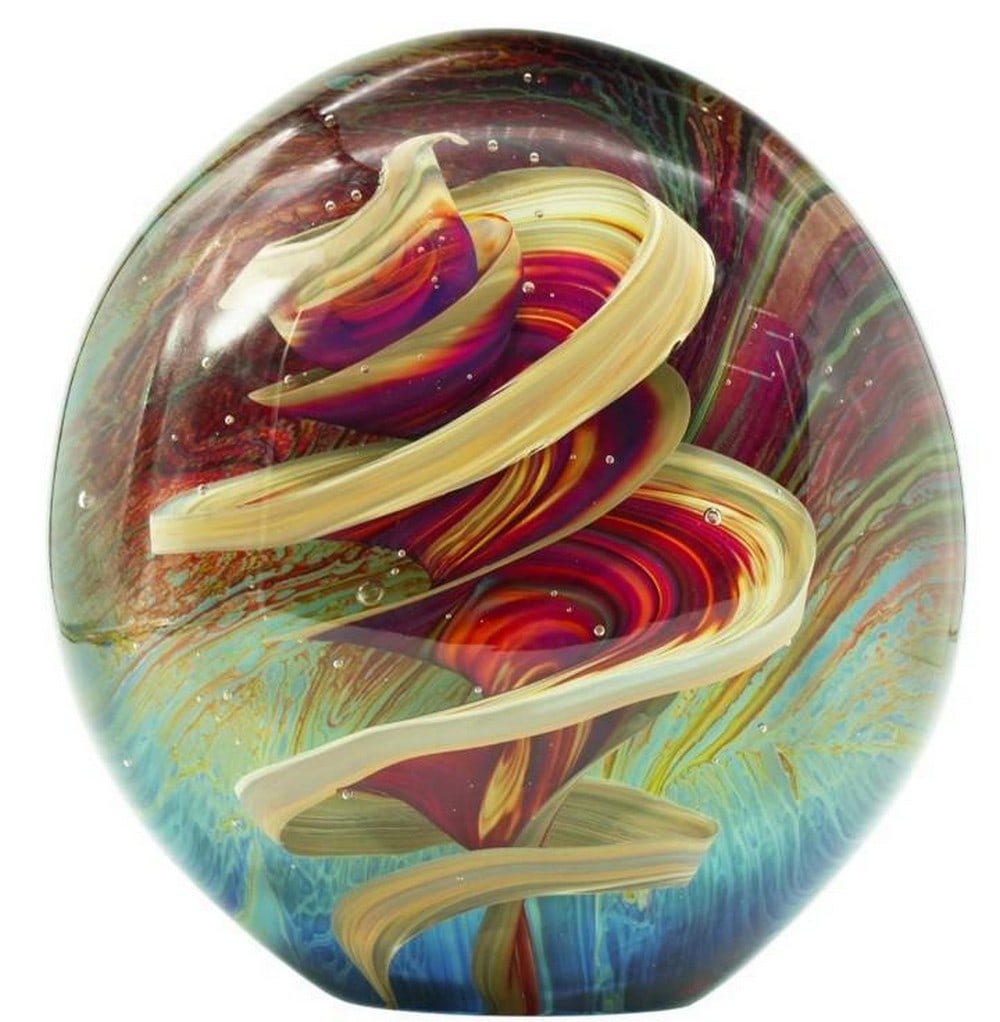 The Storm: The Storm Swirling with depth and drama, The Storm is a striking Murano glass sculpture crafted from rare chalcedony glass. Its shifting tones of red, sea green, and yellow evoke the raw energy and