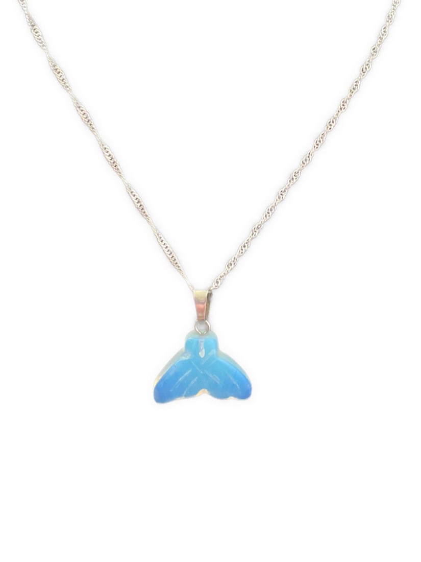 Angelic Moonstone and Sterling Silver Natural Stone Carved Fish Tail Healing Amulet: Angelic Moonstone and Sterling Silver Natural Stone Carved Fish Tail Healing Amulet Moonstone represents inner clarity, cyclical change, and a connection to the feminine. It is a symbol of light and