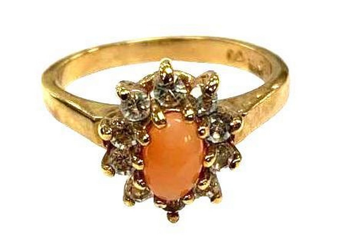 Ladies Coral Ring Size 6: Ladies Coral Ring Size 6 This ring is Gold Plated and surrounded by Austrian Crystals. Austrian Crystals focus on representing rebirth, focus and communication. While the Coral Stone can offer