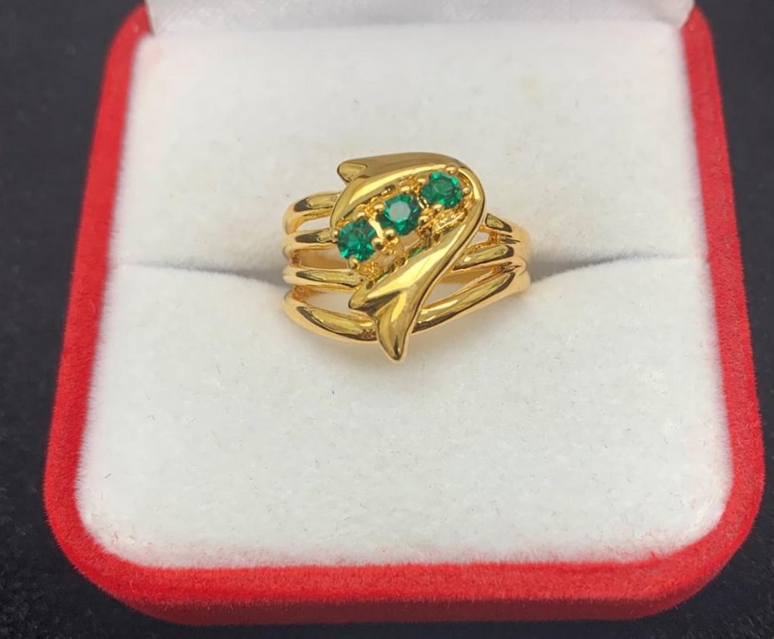 Gold Ring Inset 3 Green Gemstones On A Woven Banded Crown: Gold Ring Inset 3 Green Emerald Gemstones On A Woven Banded Crown. Emeralds are unique stones with unique capabilities. They are known to improve and enhance clairvoyance, helping one to perhaps tune