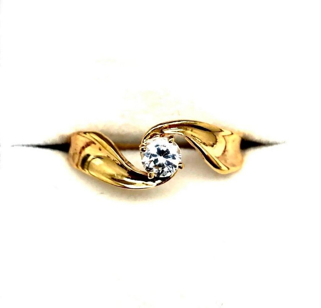 Swarovski Crystals In Yellow Gold Electroplate Finish Ring: Swarovski Crystals In Yellow Gold Electroplate Finish Ring. Nickel Allergy Free, Base Metal- Brass, 18KTGP Yellow Gold Electroplate Finish. Rings Have 120 Mils 18kt Gold Finish. Size: 7, and 8
