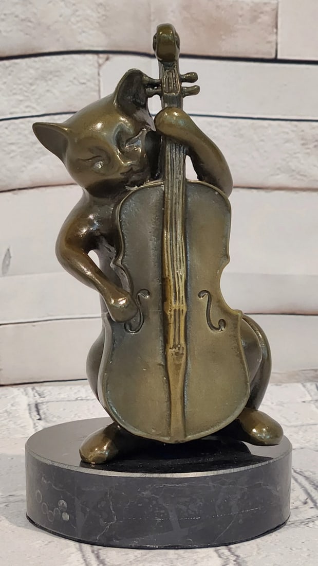 Bronze Cat Playing Cello Sculpture by Miguel Lopez - 8" x 4": Bronze Cat Playing Cello Sculpture by Miguel Lopez - 8" x 4" Introducing a Bronze Sculpture: This depiction of a cat playing the cello is handcrafted with attention to detail. The figure is sh