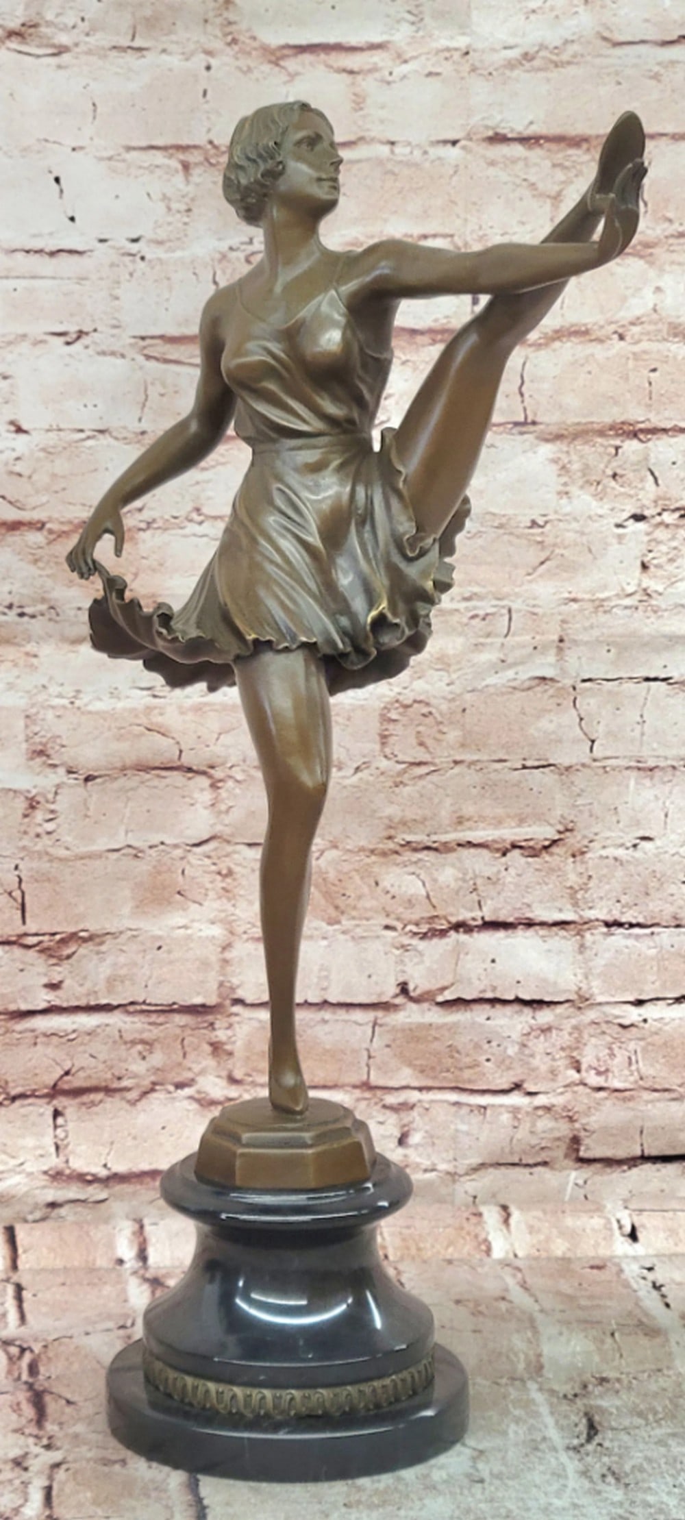 Bronze Sculpture of Ballet Dancer on Marble Base - 21.5" x 11": Bronze Sculpture of Ballet Dancer on Marble Base - 21.5" x 11" Introducing a Bronze Sculpture: This composition depicts an elegant ballet dancer captured in a poised moment of movement. The fi