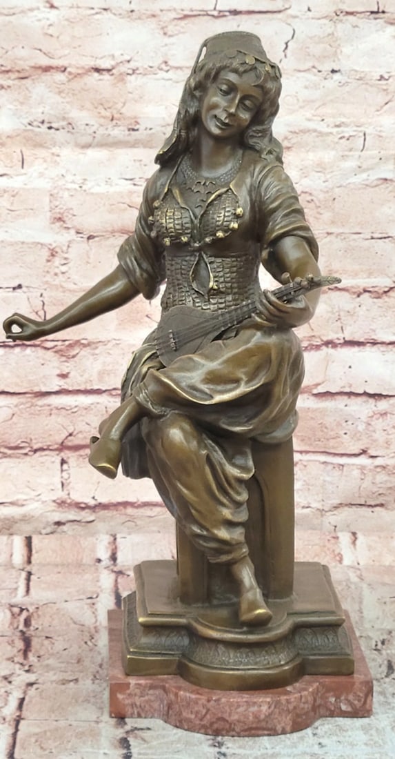 Bronze Gypsy Woman Playing Mandolin Sculpture Figurine: Bronze Gypsy Woman Playing Mandolin Sculpture Figurine Custom Made Bronze Sculpture Featuring A Graceful Gypsy Woman Seated While Playing A Mandolin, Capturing A Moment Of Musical Expression And Cultu