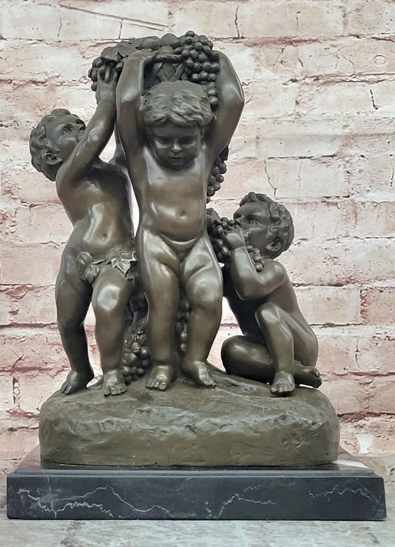 Bronze Sculpture of 3 Putti with Grapes on Marble Base - 13" x 9": Bronze Sculpture of 3 Putti with Grapes on Marble Base - 13" x 9" Introducing a Bronze Sculpture: This composition depicts three playful putti gathered around a bunch of grapes, symbolizing ab