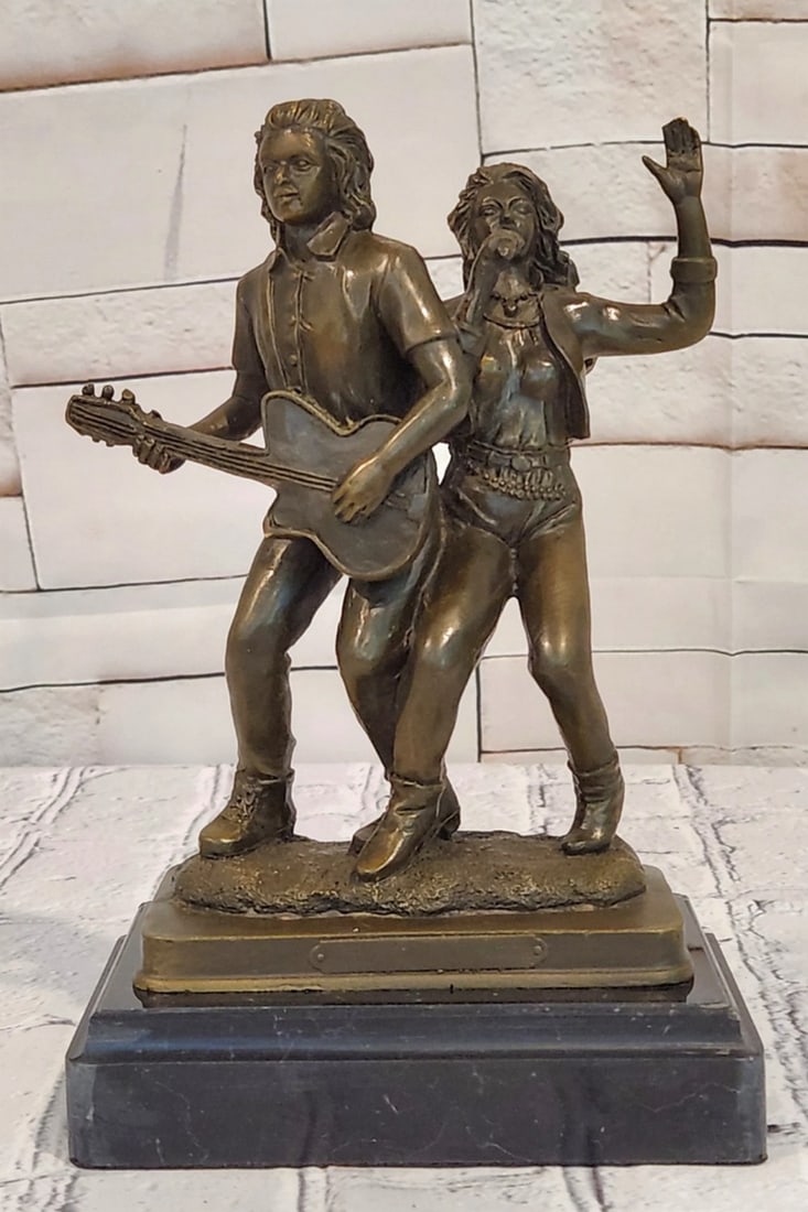 Male Guitarist and Female Singer Bronze Sculpture by Williams - 9" x 5.5": Male Guitarist and Female Singer Bronze Sculpture by Williams - 9" x 5.5" Introducing a Bronze Sculpture: This depiction of a male guitarist and female singer is handcrafted with attention to 