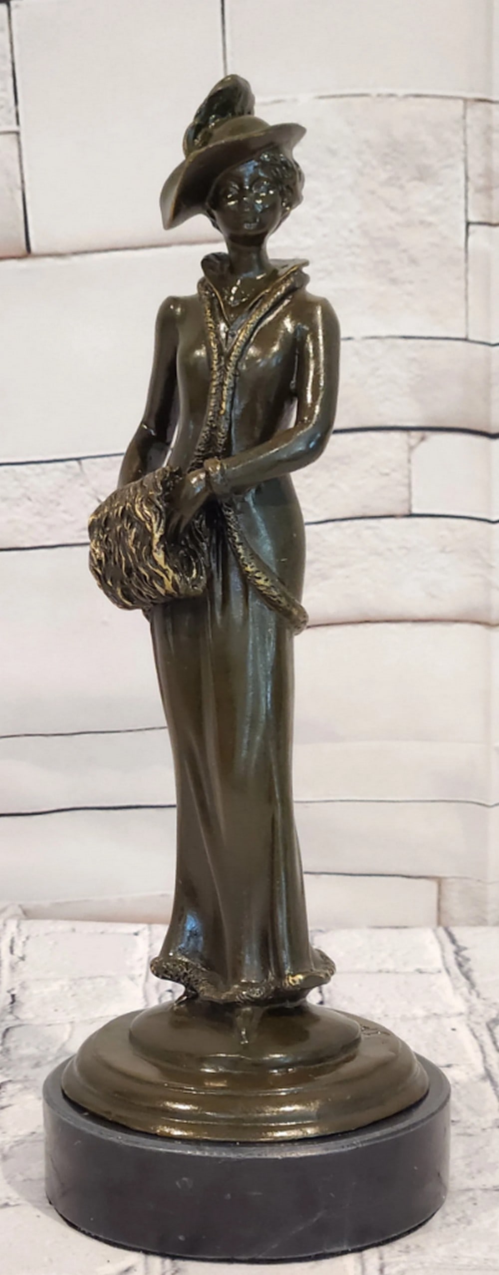 Art Deco Lady Bronze Sculpture by Jean Patoue - 12" x 4": Art Deco Lady Bronze Sculpture by Jean Patoue - 12" x 4" Introducing a Bronze Sculpture: This depiction of a refined lady is handcrafted with attention to detail. The figure is shown standing 