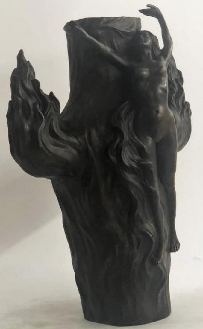 Nature's Embrace Bronze Sculpture: Nature's Embrace Bronze Sculpture Mysterious and enchanting, this large hot cast bronze reproduction sculpture presents a stunning nude nymph seamlessly intertwined with nature. Her elongated form is 