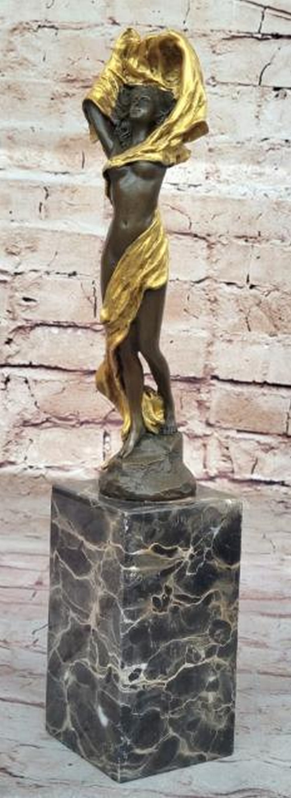 Semi-Nude Woman with Draped Clothing Bronze Sculpture: Semi-Nude Woman with Draped Clothing Bronze Sculpture Sensual and striking, this bronze sculpture captures a captivating moment as a woman lifts loose, flowing clothing over her head, revealing her se