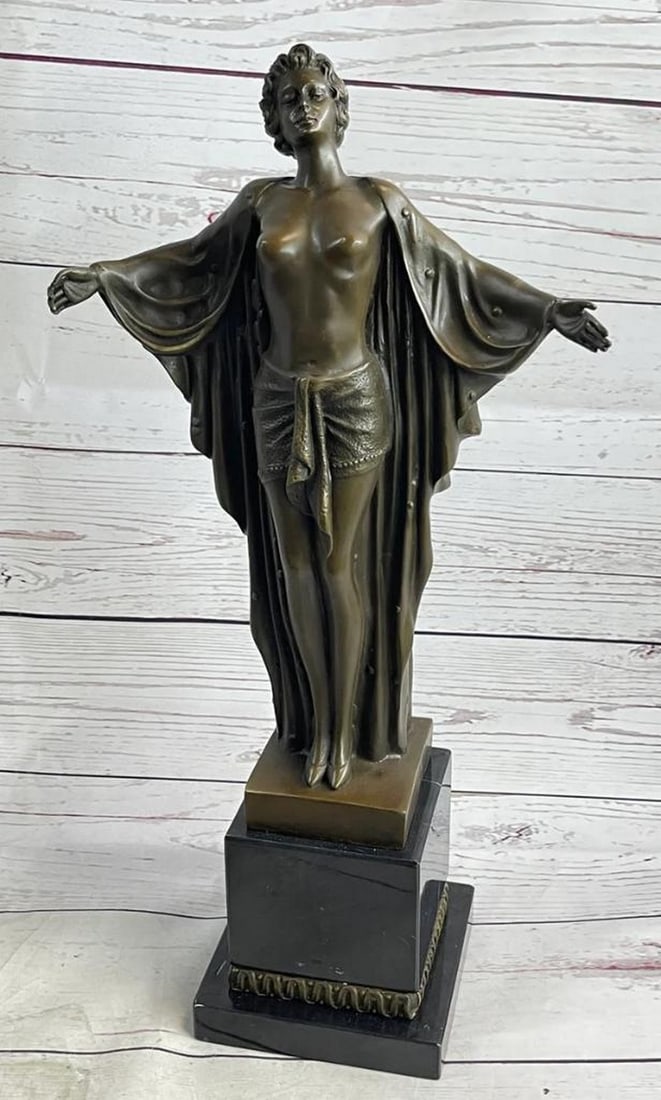 The Female Awakening Inspired Bronze Statue: The Female Awakening Bronze Statue This exquisite Art Nouveau bronze sculpture bearing the signature of artist F. Preiss, showcases a nude woman in a gracefully expressive pose. Mounted on a sleek bla
