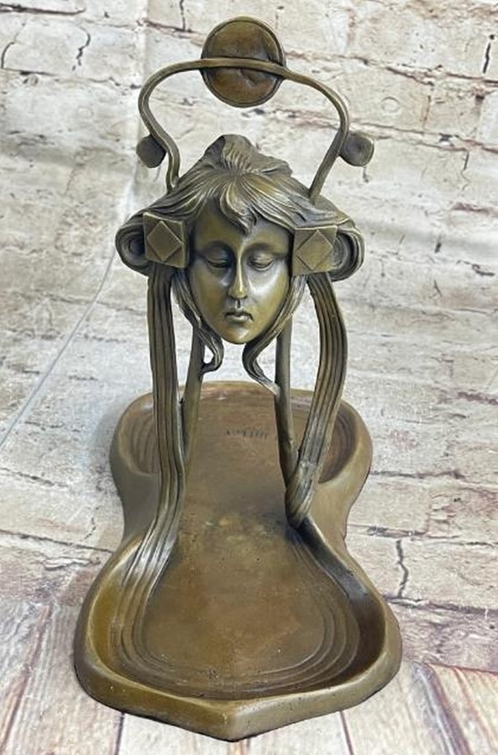 Art Nouveau Reproduction Bronze Nude Trinket Tray: Art Nouveau Reproduction Bronze Lady Trinket Tray A captivating blend of Art Deco and Art Nouveau styles, this reproduction bronze trinket tray features an abstract depiction of female figure. Her ser