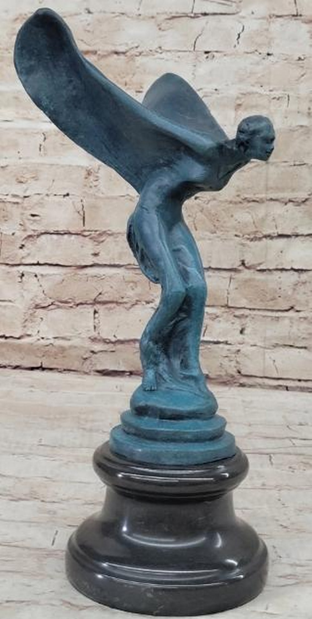 The Flying Lady Reproduction Bronze Sculpture: The Flying Lady Reproduction Bronze Sculpture Inspired by Charles Sykes' iconic Spirit of Ecstasy design, this elegant bronze sculpture captures the timeless beauty and motion of the famed flying lady