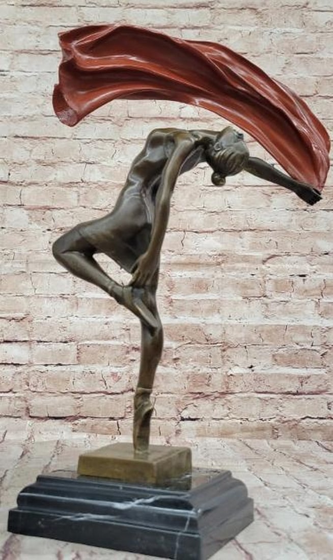 Arc of Elegance: Bronze Dancer with Red Patina Fabric: Arc of Elegance: Bronze Dancer with Red Patina Fabric This captivating bronze sculpture bearing the signature of artist Aldo Vitaleh showcases a female dancer in a stunning pose of strength and fluidi