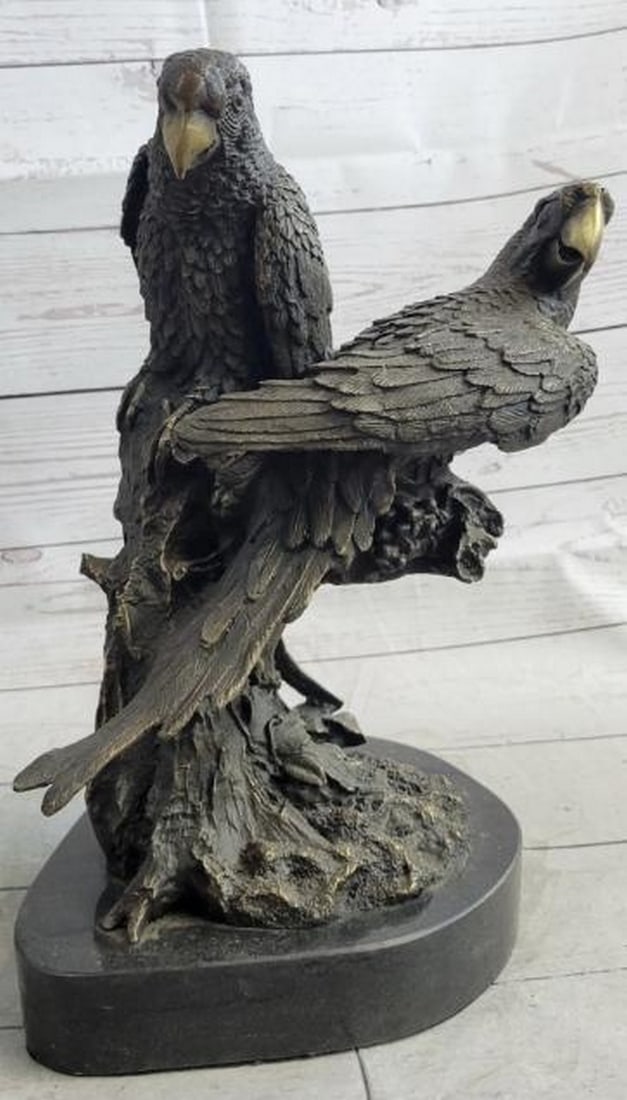 Pair of Parrots Bronze Sculpture: Pair of Parrots Bronze Sculpture Vibrant and full of life, this elegant bronze sculpture captures a pair of parrots perched in harmony, their graceful forms and attentive expressions bringing a sense 