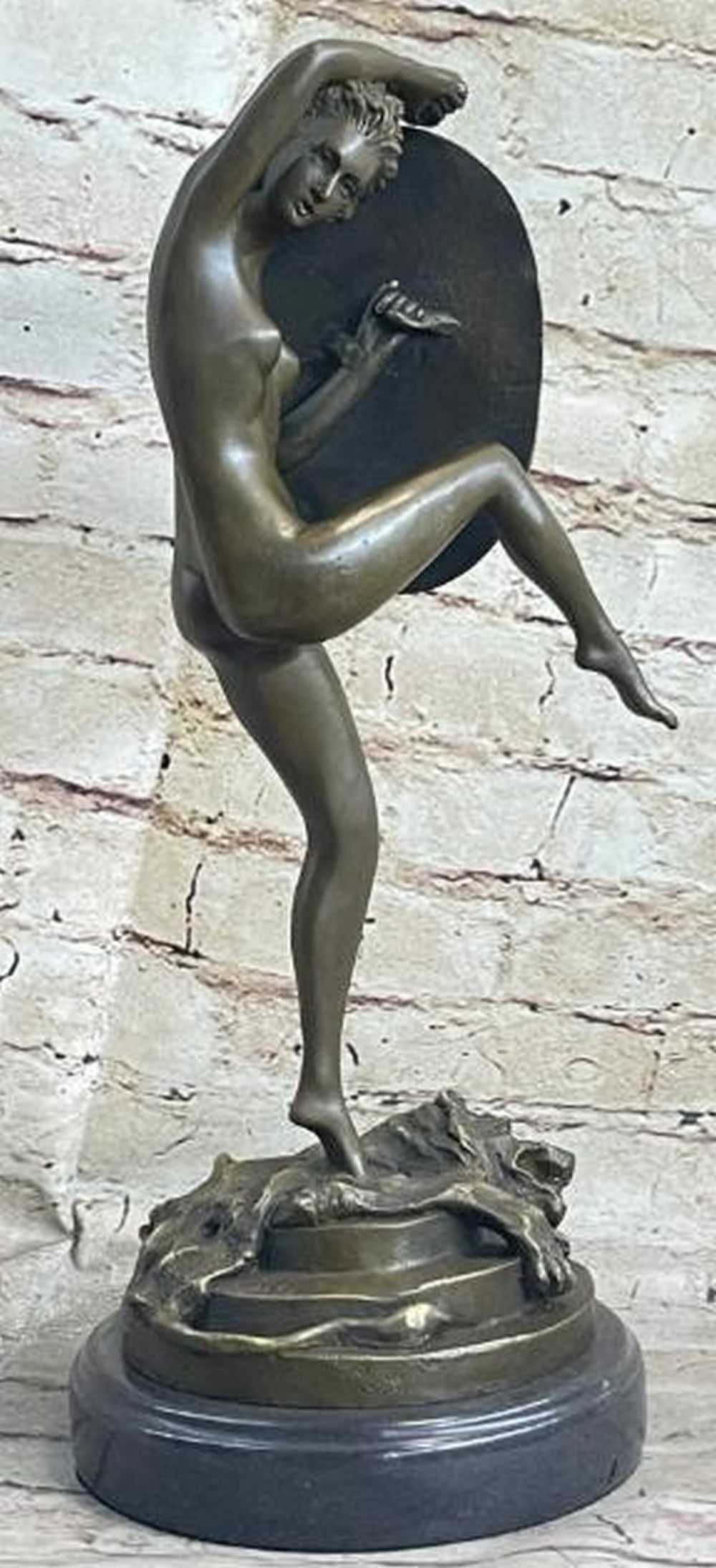 Justice Unveiled: Bronze Lady Justice with Sword and Shield: Justice Unveiled: Bronze Lady Justice with Sword and Shield Striking and symbolic, this bronze sculpture presents a bold interpretation of Lady Justice, depicted nude yet empowered, standing atop a li
