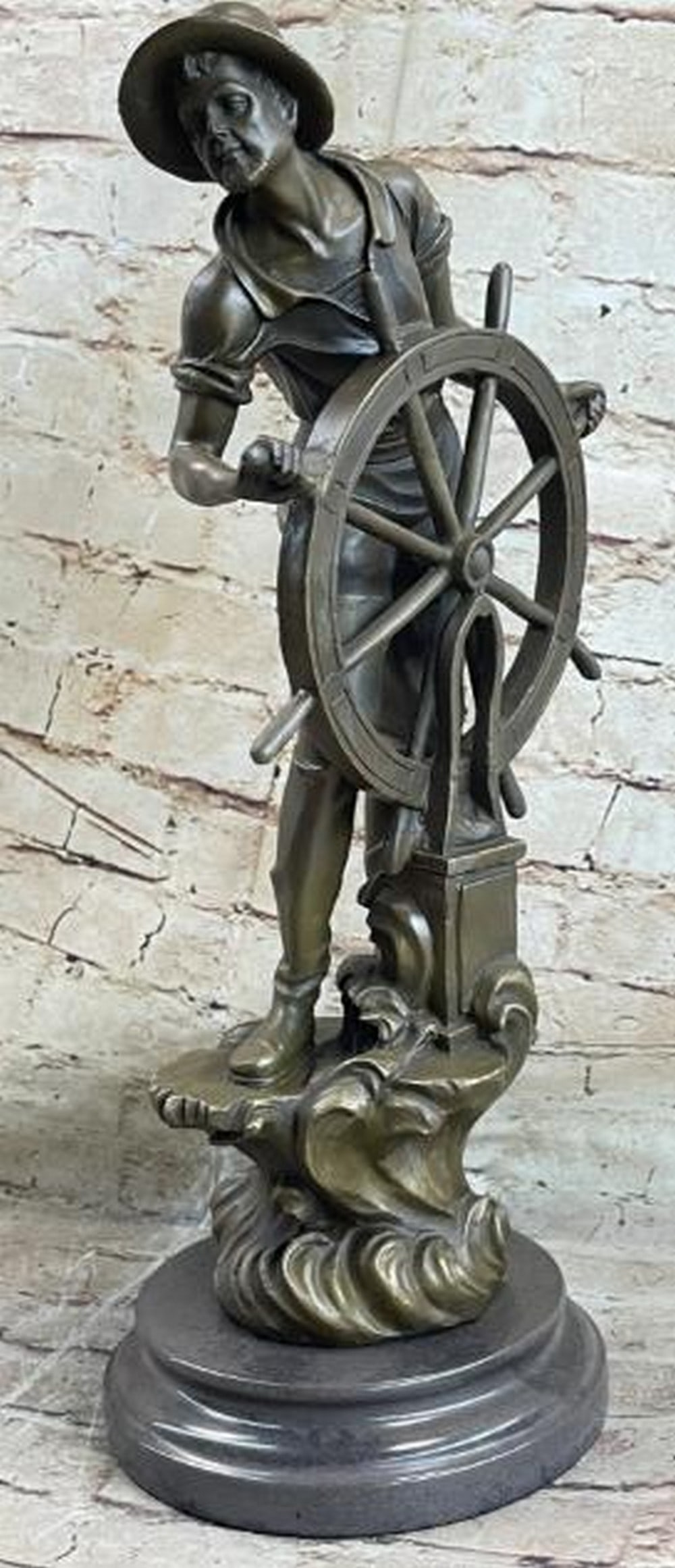 At the Helm: Bronze Nautical Captain Sculpture: At the Helm: Bronze Nautical Captain Sculpture Bearing the signature of artist Fisher, this bronze sculpture captures a seasoned ship captain or fisherman standing proudly at the helm. Dressed in clas